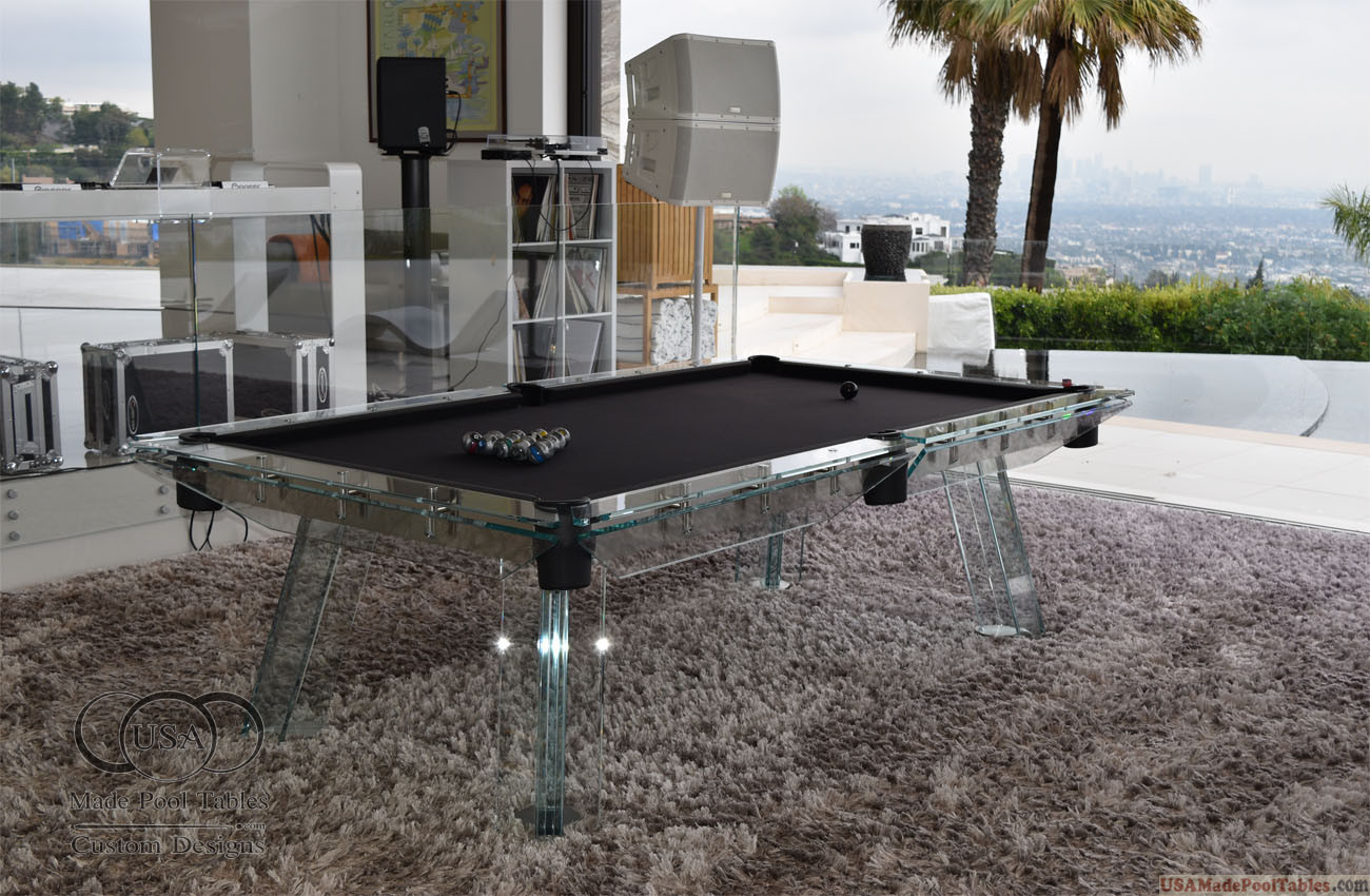 Want a super modern game room? Glass pool tables offer very sleek and cool designs today.